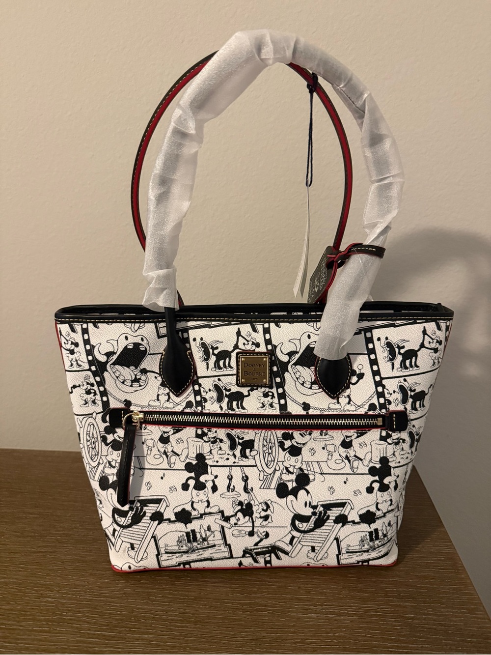 Dooney & Bourke Disney Black and White Comic Strip Shoulder Tote with Red Trim